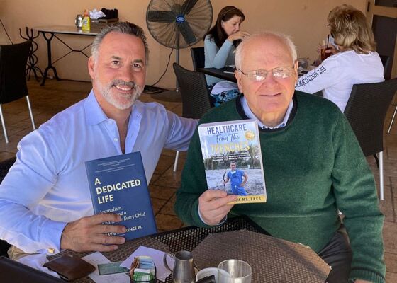 Dave Lawrence Jr and Alejandro Badia with our books